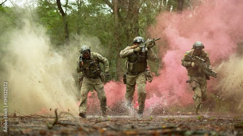Brave military men in action, slow motion