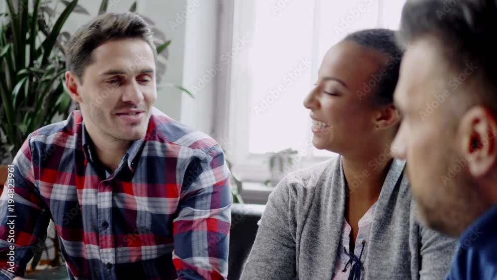 Multi-ethnic colleagues in a coworking office. Multi-ethnic colleagues in a coworking office.