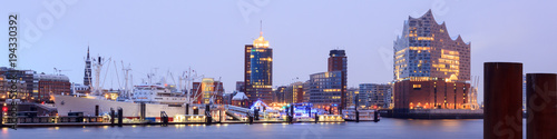 Elbe Philharmonic Hall (Elbphilharmonie) and River Elbe panorama in winter at morning with snow in Hamburg, Germany photo