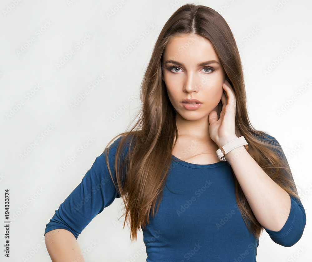beautiful young woman with long brown hair wearing wrist watch beautiful young woman with long brown hair wearing wrist watch