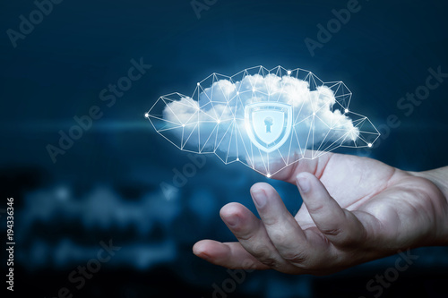 Hand shows a data cloud with a protective shield.
