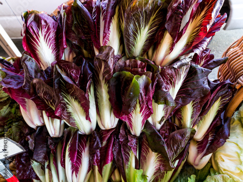 Red chicory in a pile for sale at a farmers market
