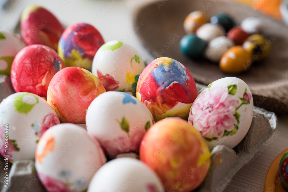 Colored Easter eggs in the basket.Easter Eggs hand painted.Easter eggs in a wooden basket