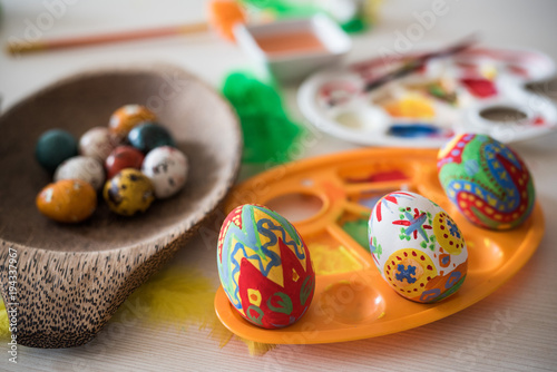 Colored Easter eggs in the basket.Easter Eggs hand painted.Easter eggs in a wooden basket