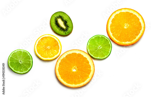 grapefruit, kiwi, orange, lime on white background