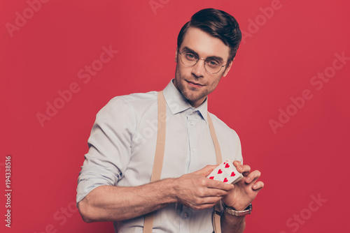 Obraz na plátně Professional, cunning magician, poker player, gambler in casual outfit, glasses