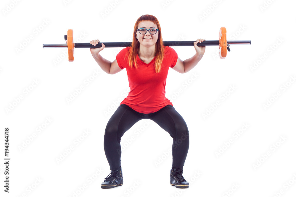 Portrait of a focused smiling fitness woman doing squats with barbell isolated on a white background Portrait of a focused smiling fitness woman doing squats with barbell isolated on a white background