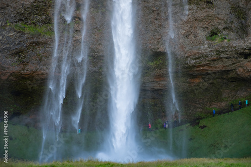 Tourists Behind Seljalandsfoss