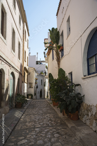 Fototapeta Naklejka Na Ścianę i Meble -  Street in catalan town Sitges, Spain