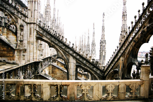 Fragment of a roof and balcony of Duomo in Milan