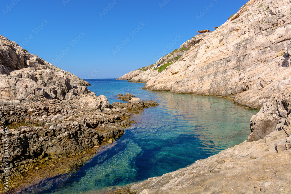 Small bay with crystal sea water. Korakonisi Island on western side of Zakynthos. Zante, Greece