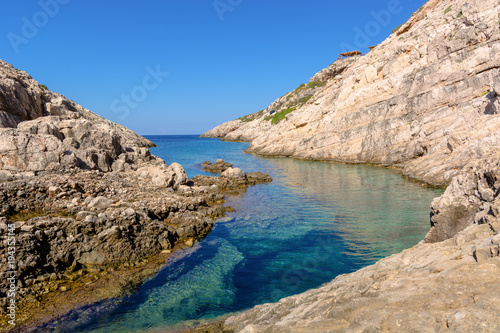 Small bay with crystal sea water. Korakonisi Island on western side of Zakynthos. Zante, Greece