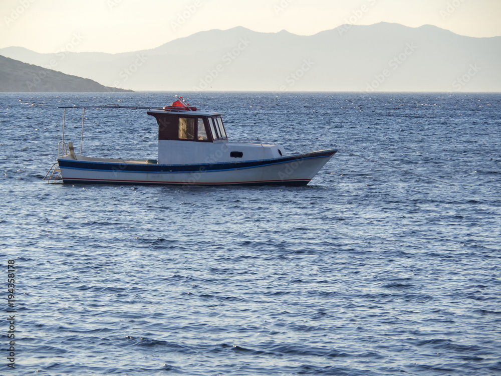 Empty boat waiting on Egean sea
