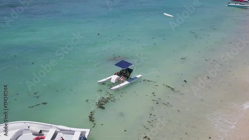 Aerial of paddle boat on Mauritius photo