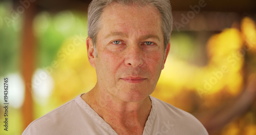Fotografie Portrait of a somber mid aged white man