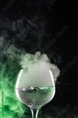 Wine glass with smoke inside and out