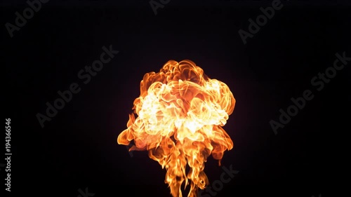 Flames rising up on a black background, slow motion photo