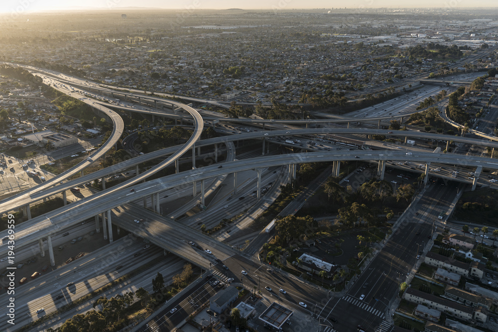 Aerial dawn view of 105 and 110 freeway interchange ramps in Los ...