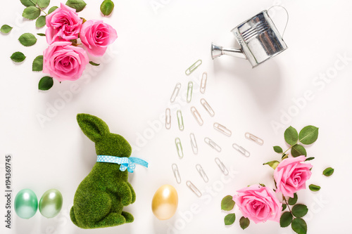 Easter theme with roses, watering can and bunny