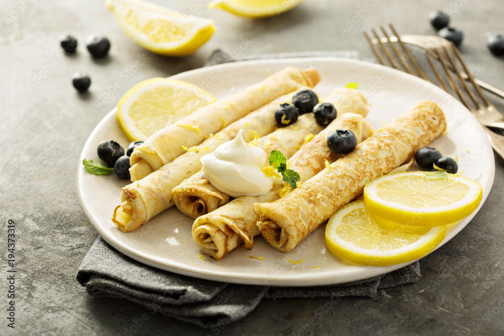 Crepes with lemon filling and blueberries