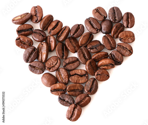 Coffee beans in shape of heart  heart from coffee beans isolated on a white background  