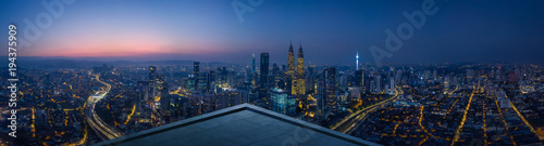 Open space balcony with Kuala Lumpur cityscape skyline view  . Night scene .