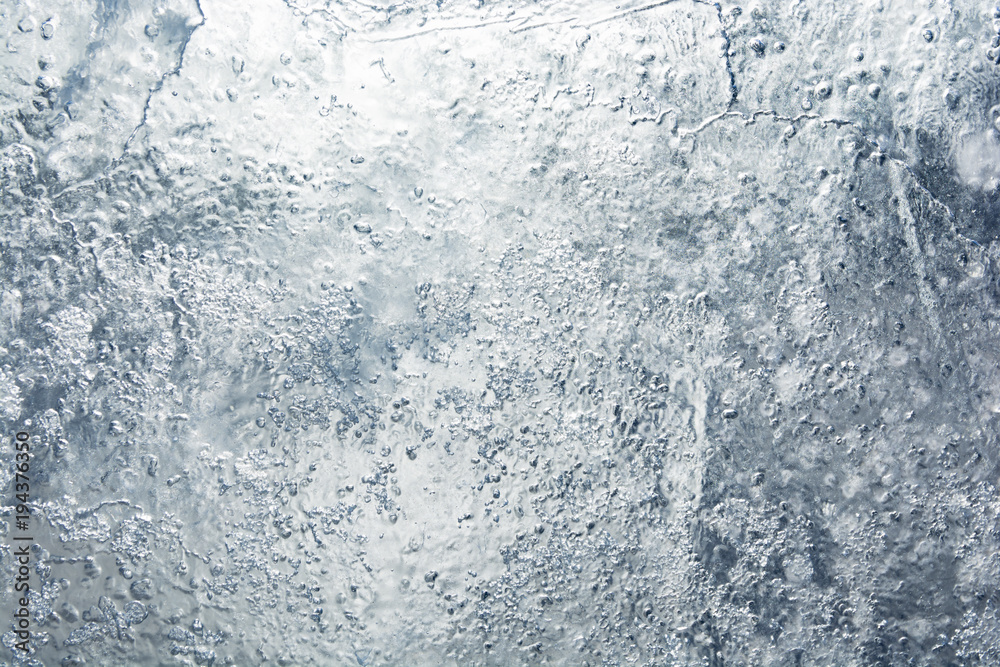 The texture of the ice. The frozen water.Winter background The texture of the ice. The frozen water.Winter background