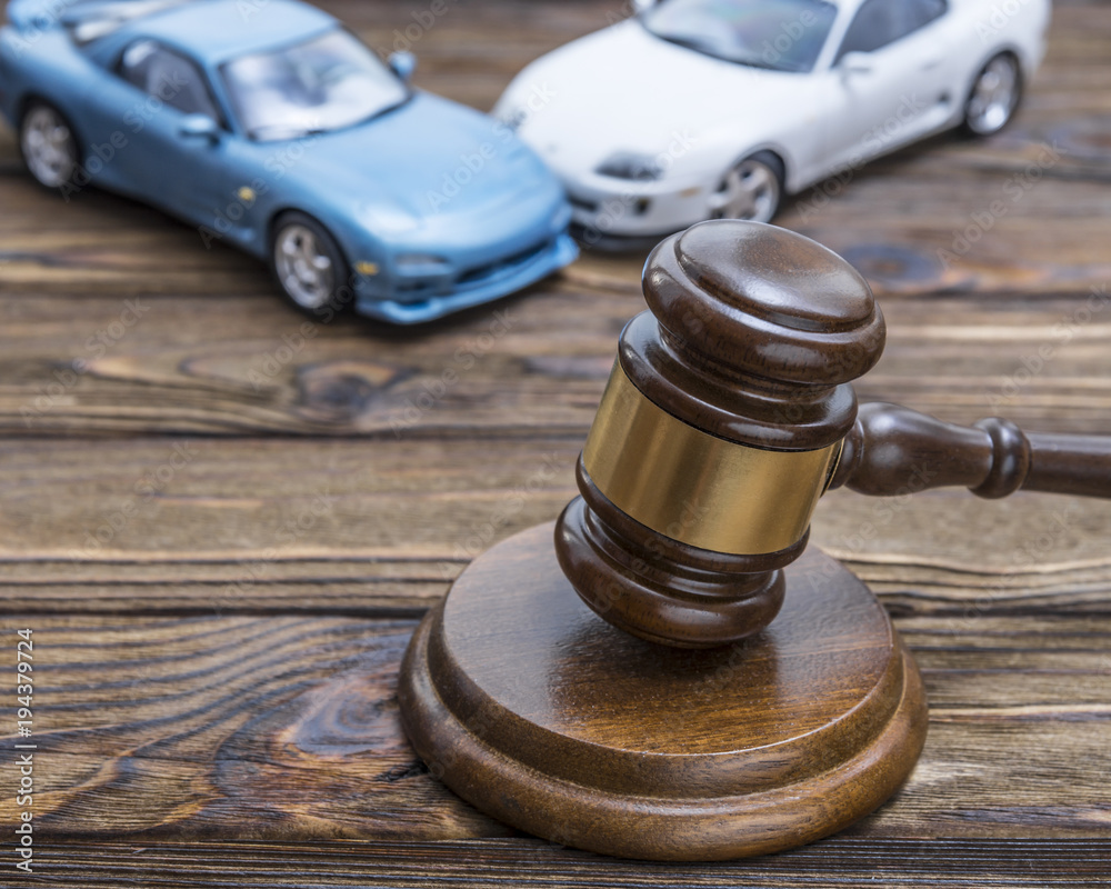 Gavel of the judge. you have two cars. auto insurance. damage to property. Police, road traffic accident Gavel of the judge. you have two cars. auto insurance. damage to property. Police, road traffic accident