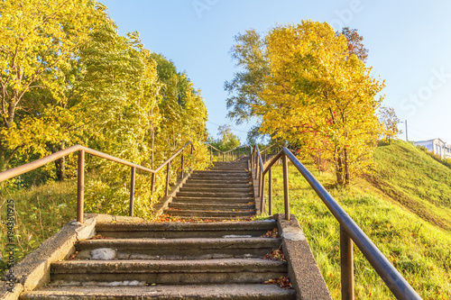 A staircase among the autumn trees