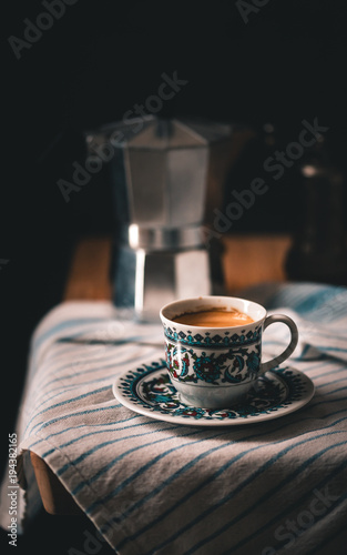 coffee cup in dark moody setting