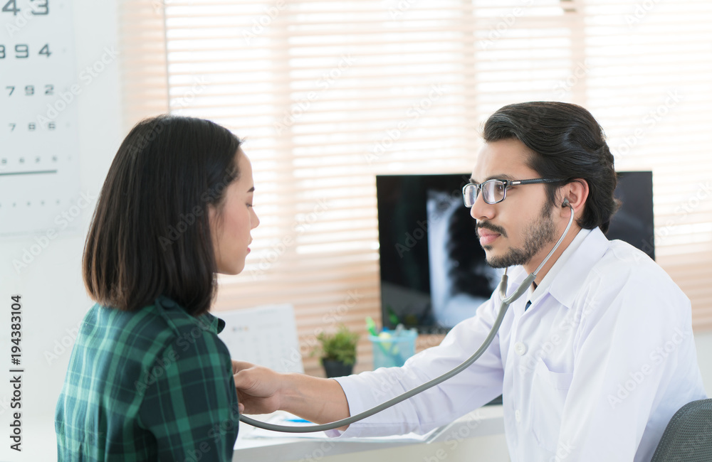 Doctors are using a stethoscope to check lungs and heart. Doctors are using a stethoscope to check lungs and heart.