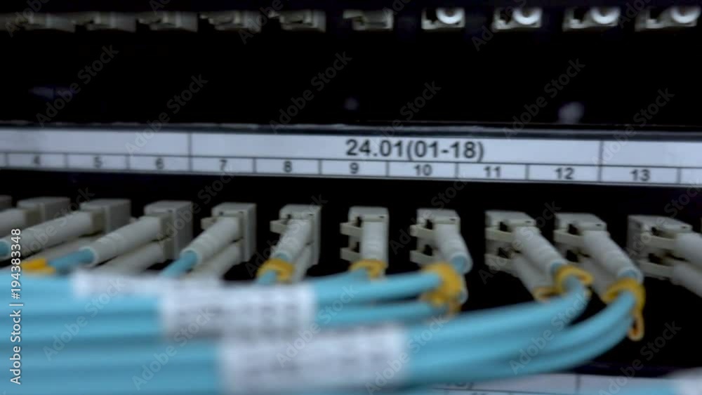 Optical server. Optical fiber. Severs computer in a rack at the large data center. Rack Mounted Servers. Optical server. Optical fiber. Severs computer in a rack at the large data center. Rack Mounted Servers.