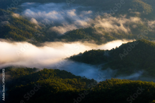 soft focus image of beautiful view sunrise of mountain with morning mist in Thailand, travel, landscape and nature concept
