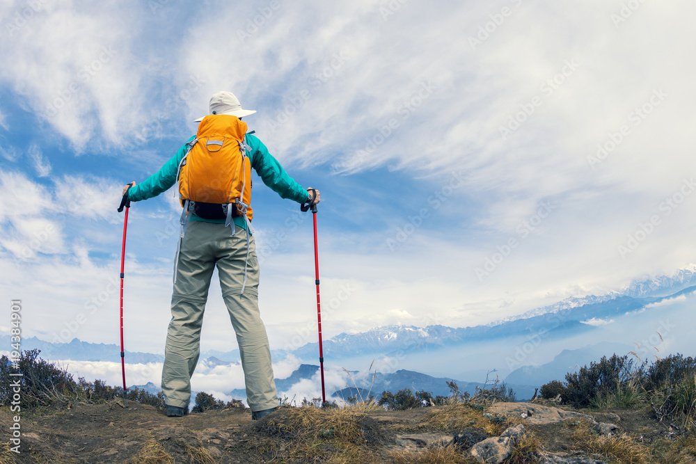 successful hiker enjoy the beautiful landscape on mountain top successful hiker enjoy the beautiful landscape on mountain top