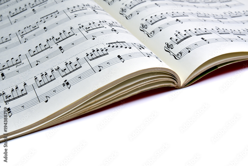 Naklejka premium Closeup sheet music. Copy space. Musical background.