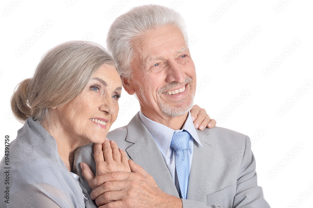 hugging senior couple on white background hugging senior couple on white background