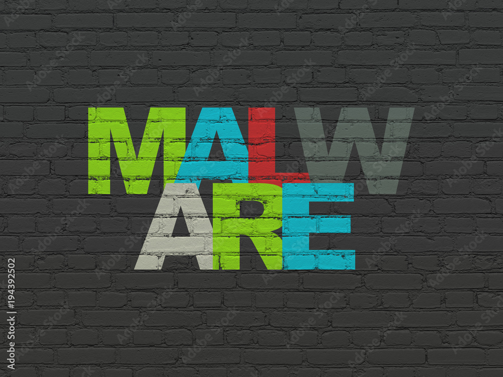 Security concept: Painted multicolor text Malware on Black Brick wall background Security concept: Painted multicolor text Malware on Black Brick wall background