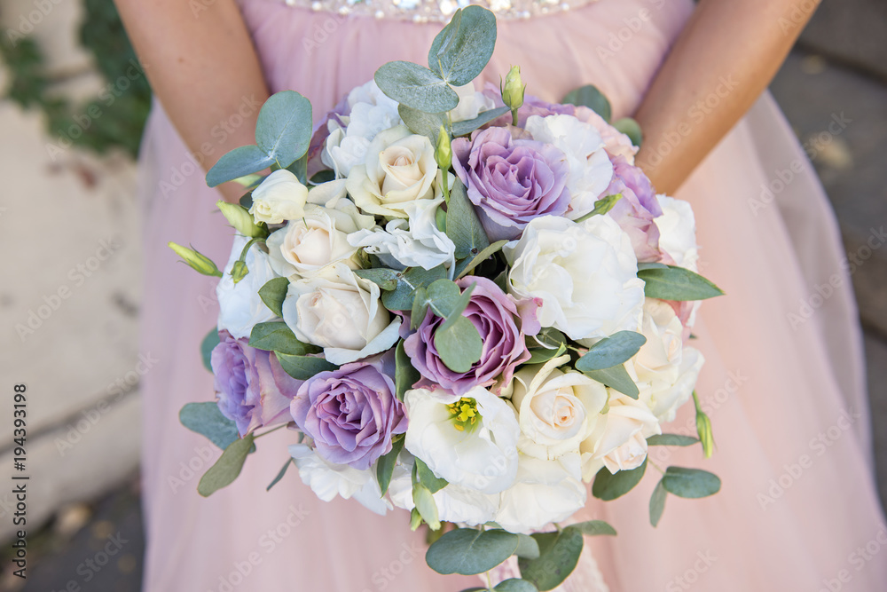 Bridal bouquet in powdery pink. Fashionable. Air tapes. Eustoma, roses, eucalyptus, lace. White, lilac and pink. Wedding day. Bride and groom. Wedding floristry