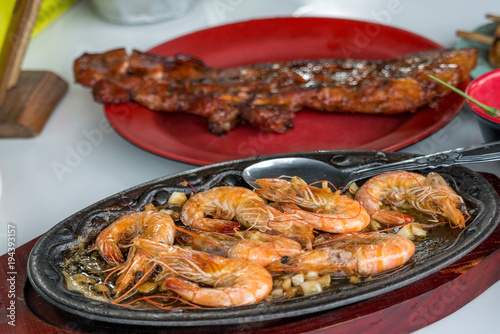 Famous food in the Philippines Butter Garlic Shrimp Sizzling Gambas