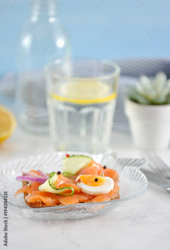sandwich with salmon, cucumber, egg and onion sandwich with salmon, cucumber, egg and onion