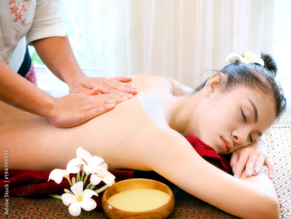 Woman having spa body massage treatment in the spa salon,Massage and body care. Woman having spa body massage treatment in the spa salon,Massage and body care.