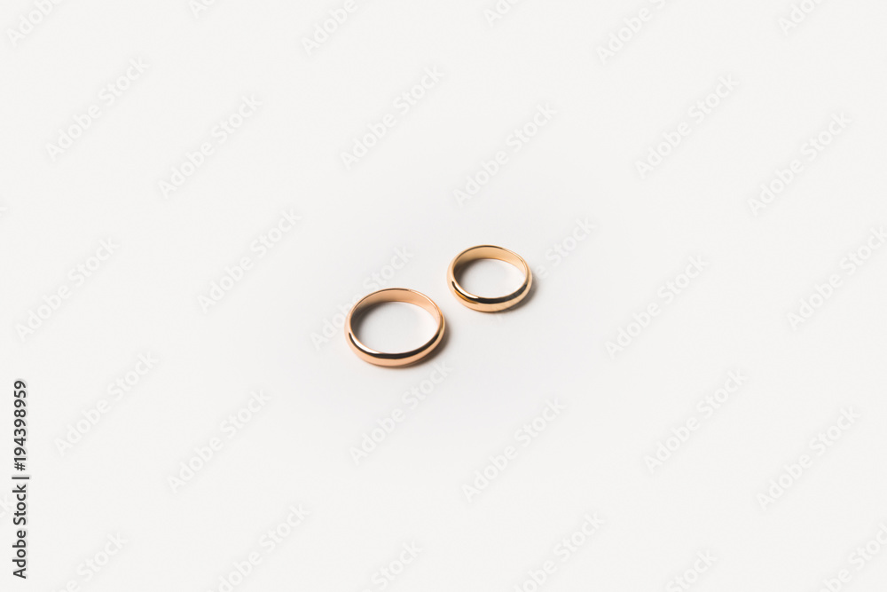 top view of golden wedding rings isolated on white