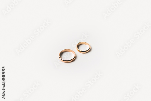 top view of golden wedding rings isolated on white