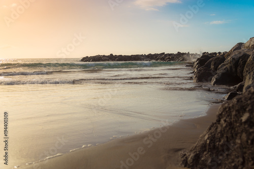 Canary Islands. Beautiful beaches on a sunny day on the island of Tenerife. Shores of the atlantic ocean.