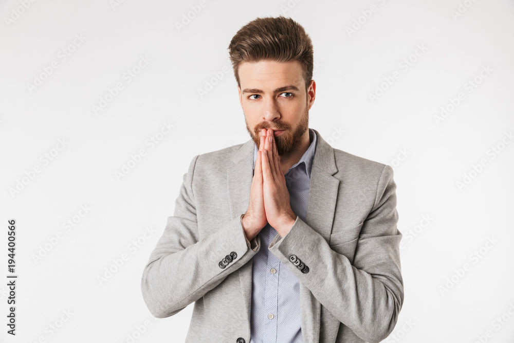 Portrait of a serious young man dressed in shirt and jacket Portrait of a serious young man dressed in shirt and jacket