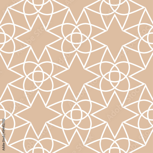 Beige and white geometric ornament. Seamless pattern