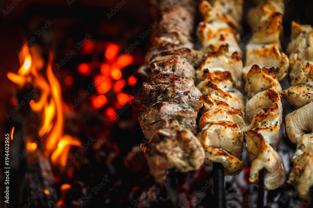 grilled pork meat on the grill close up, barbecue, shashlik, kebab, skewer on the grill grilled pork meat on the grill close up, barbecue, shashlik, kebab, skewer on the grill