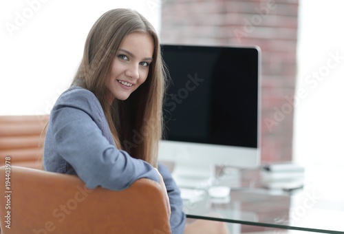 woman Manager sitting at the workplace