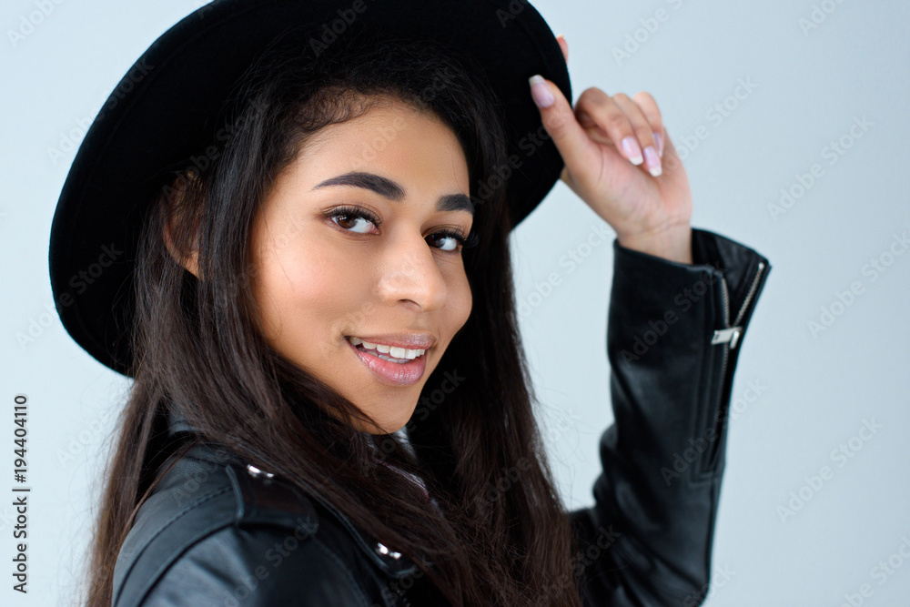 close-up portrait of beautiful young woman looking at camera isolated on grey close-up portrait of beautiful young woman looking at camera isolated on grey