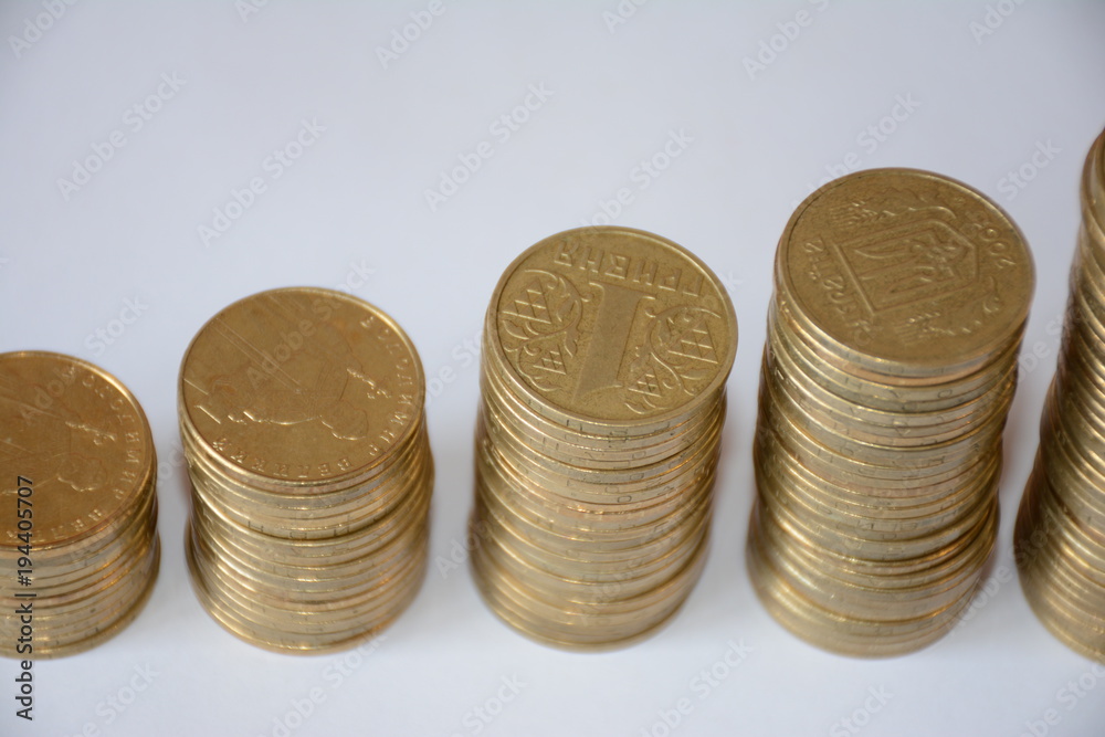 Gold iron coins on a white background. Gold iron coins on a white background.